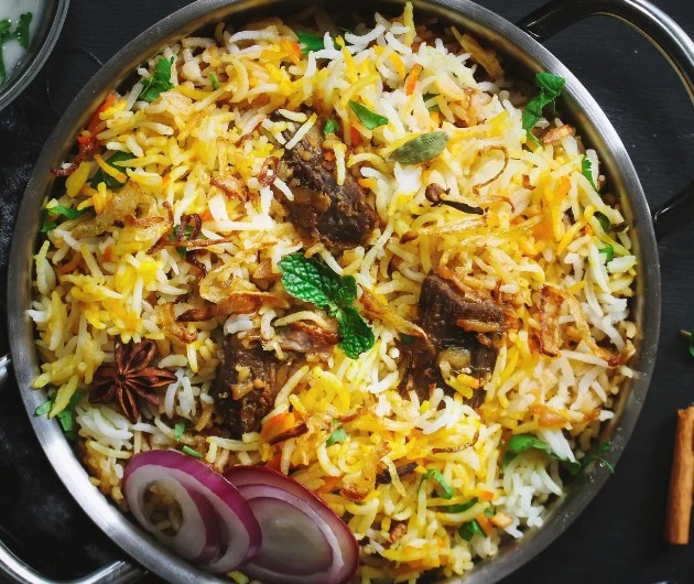 Combo Platter 4 — rice or noodles with one veggie curry and one meat dish at Taste of Sri Lanka, Winnipeg